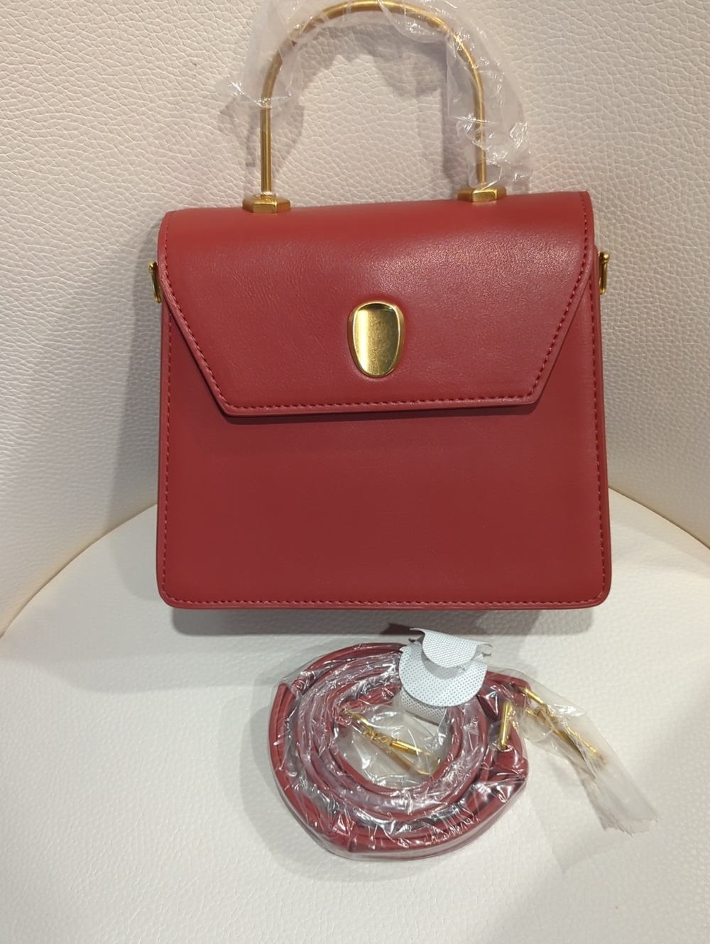 Elegant Rust Top-Handle Crossbody Bag with Gold Accent